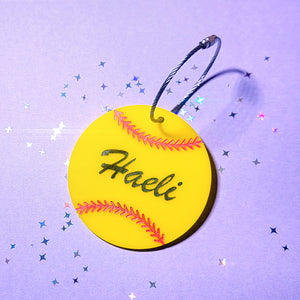 Yellow Softball Bag Tag with the name Haeli